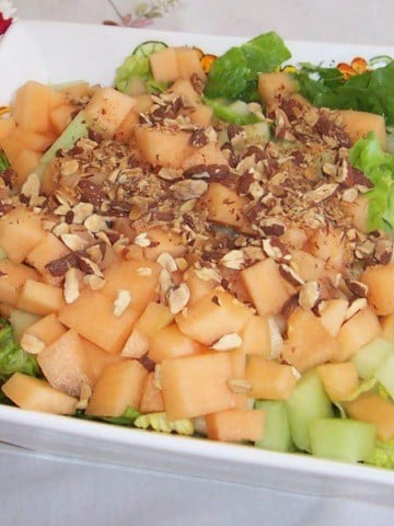 Melon and Crispy Prosciutto Salad in a bowl.